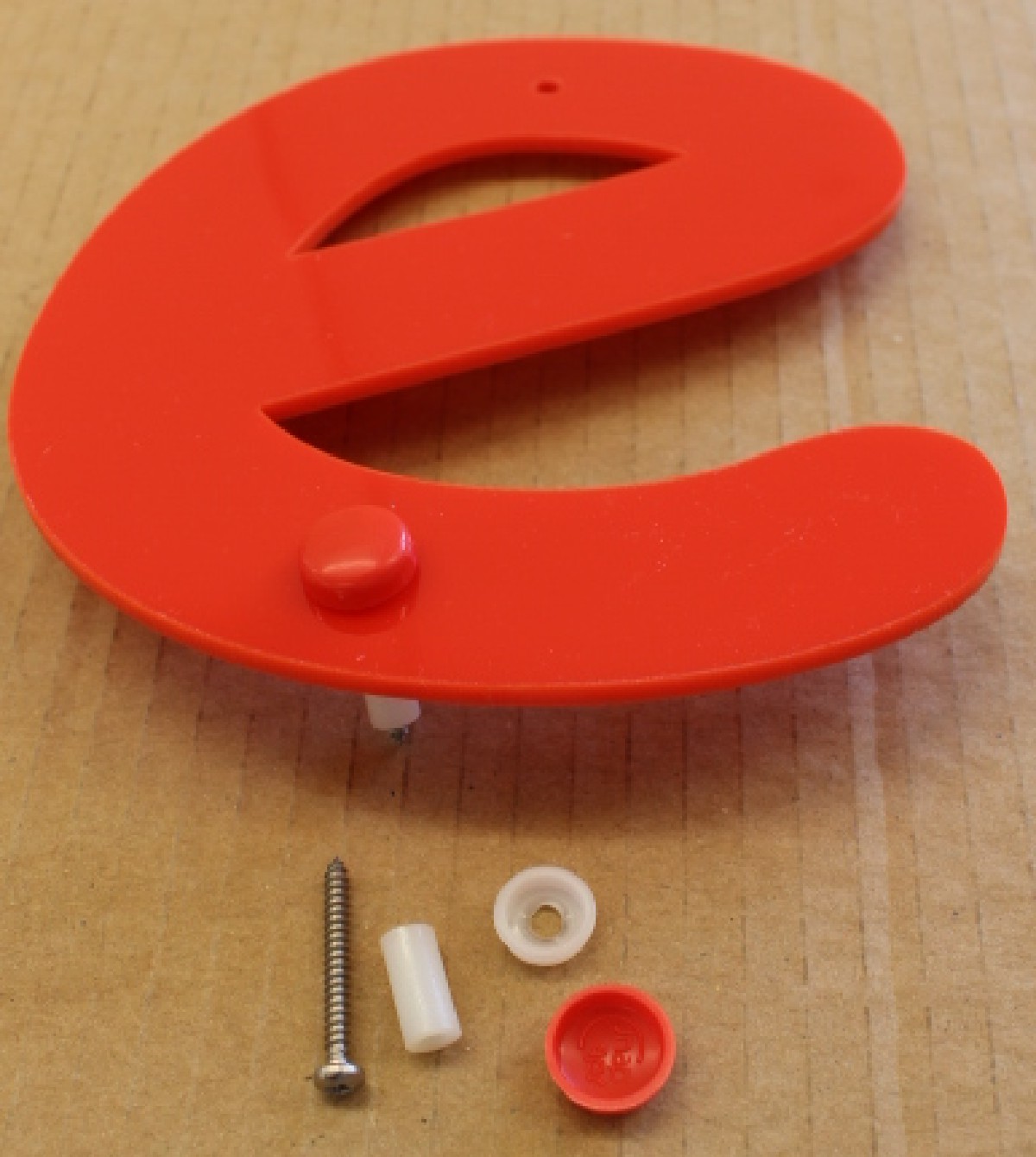 letters with screws, fittings and caps